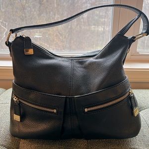 Very gently used Michael Kors bucket bag - black pebble, leather and gold trim